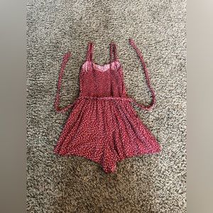 Hollister Red Romper with Flowers Size Small.